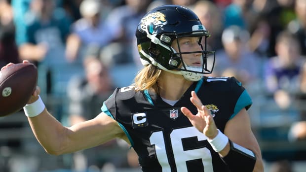 Jacksonville Jaguars quarterback Trevor Lawrence sets back to pass